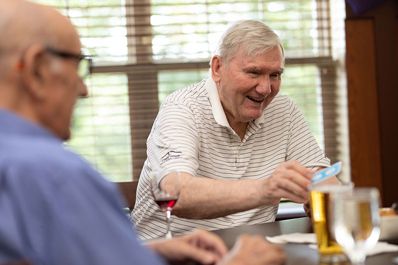 The Oaks at Bartlett | Senior men playing cards