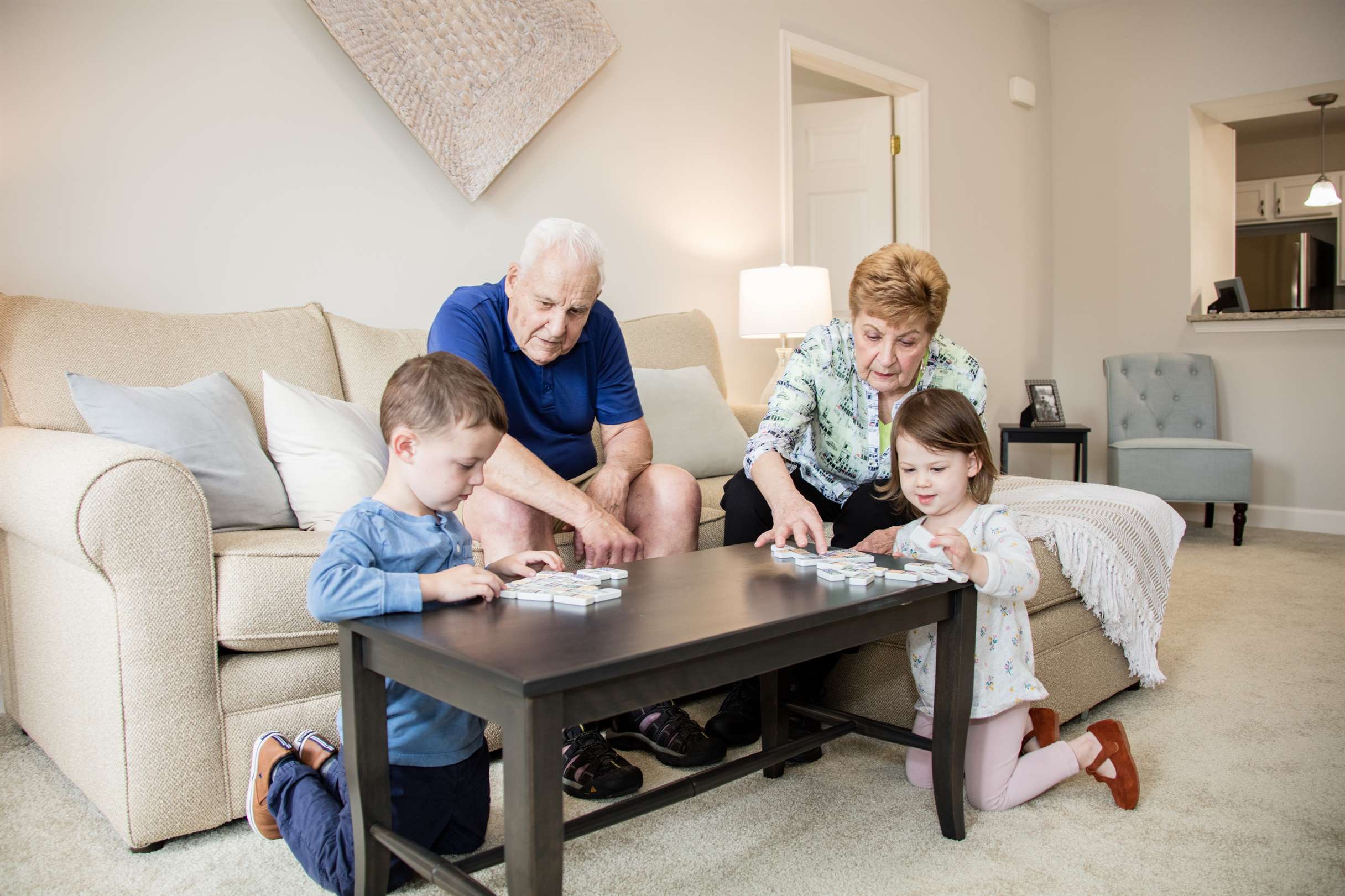 seniors playing with their grandchildren