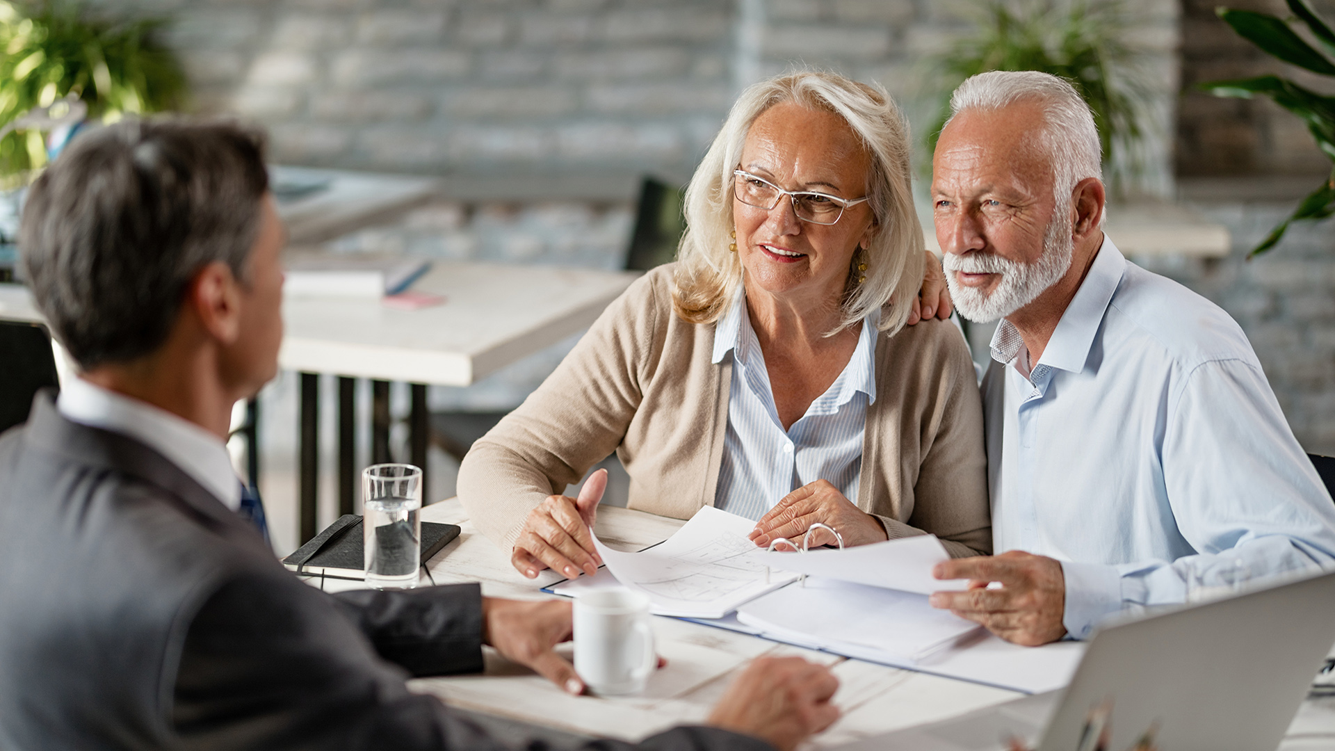 seniors looking at their senior living options with an advisor