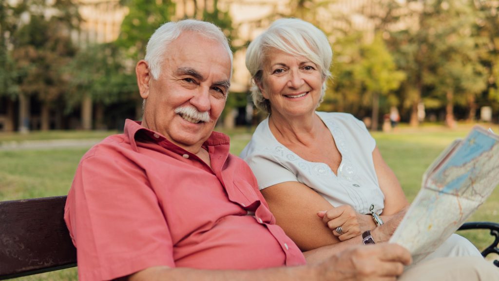 happy seniors orienting themselves around town of their new retirement community