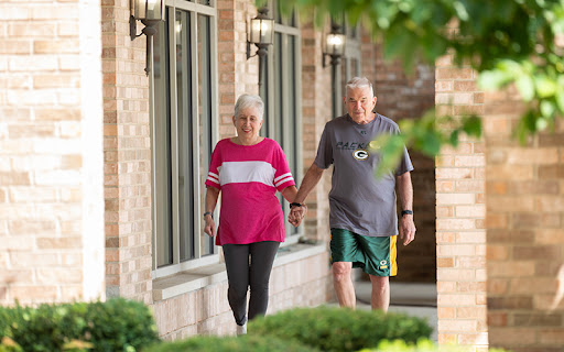 senior couple going for a walk, a great outdoor activity for seniors